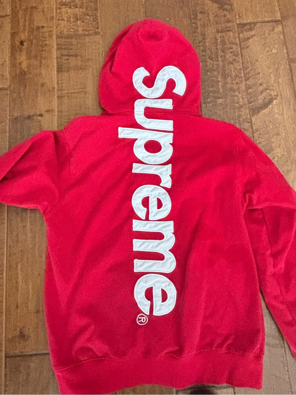 Supreme Red Hoodie with White Logo Tag